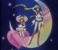 Sailor Moon and Chibi Moon in front of a moon background